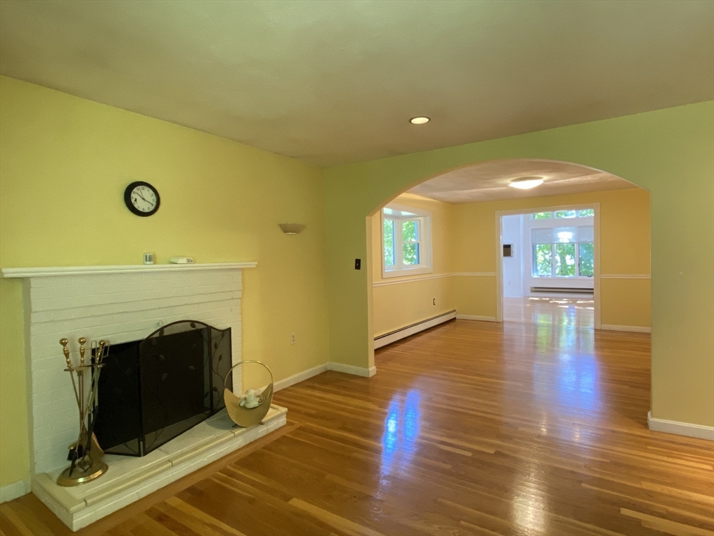 13 Oxbow Road Natick, MA 01760 - Photo 6 of 21 a living room with furniture and a fireplace