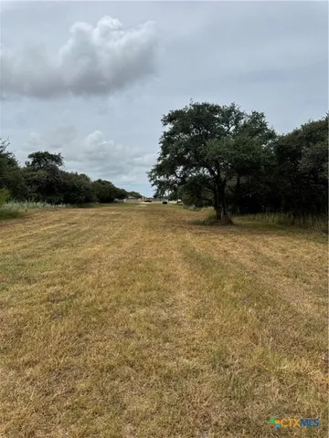 a view of ocean with sunset