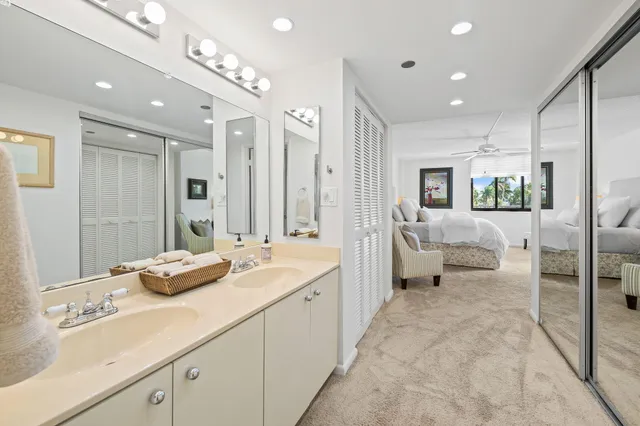 a view of a patio with table and chairs and potted plants