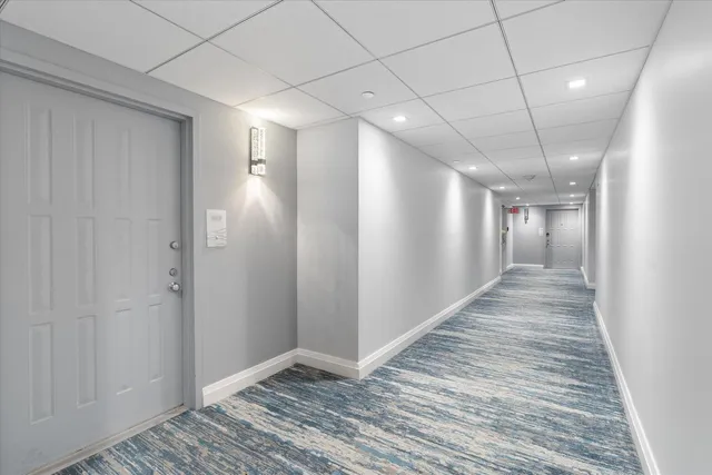 a view of a lake with sitting area