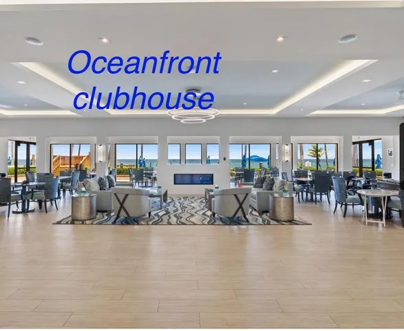 a view of a patio with a table and chairs