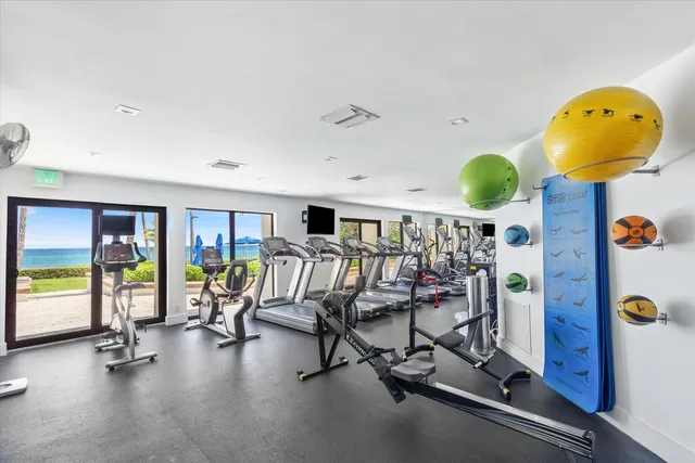 a view of swimming pool with outdoor seating and a patio