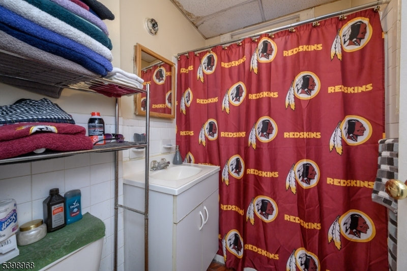 427 North 12th Street Newark, NJ 07107 - Photo 16 of 50 a utility room with dryer and wall