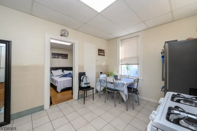 a bedroom with a bed and a shower