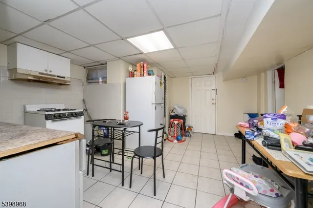 a bathroom with a sink toilet vanity and shower