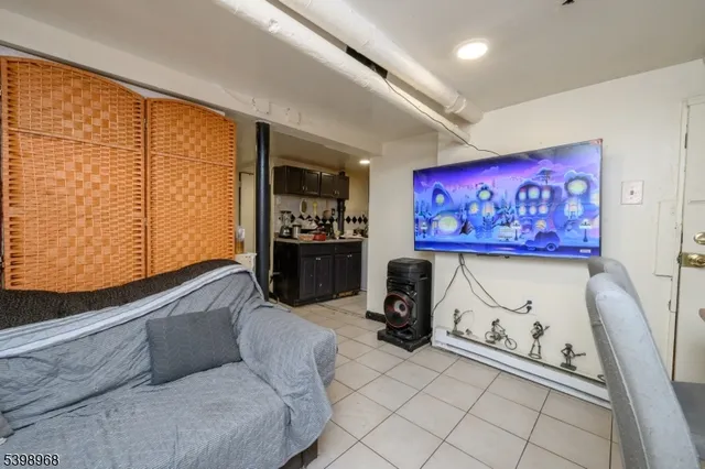 a bedroom with a bed and cabinets