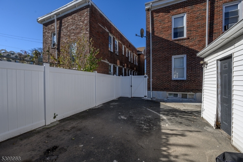 427 North 12th Street Newark, NJ 07107 - Photo 48 of 50 a view of a house with brick walls