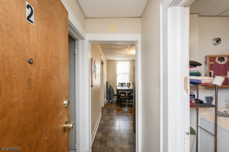427 North 12th Street Newark, NJ 07107 - Photo 10 of 50 a view of a hallway with closet and a window
