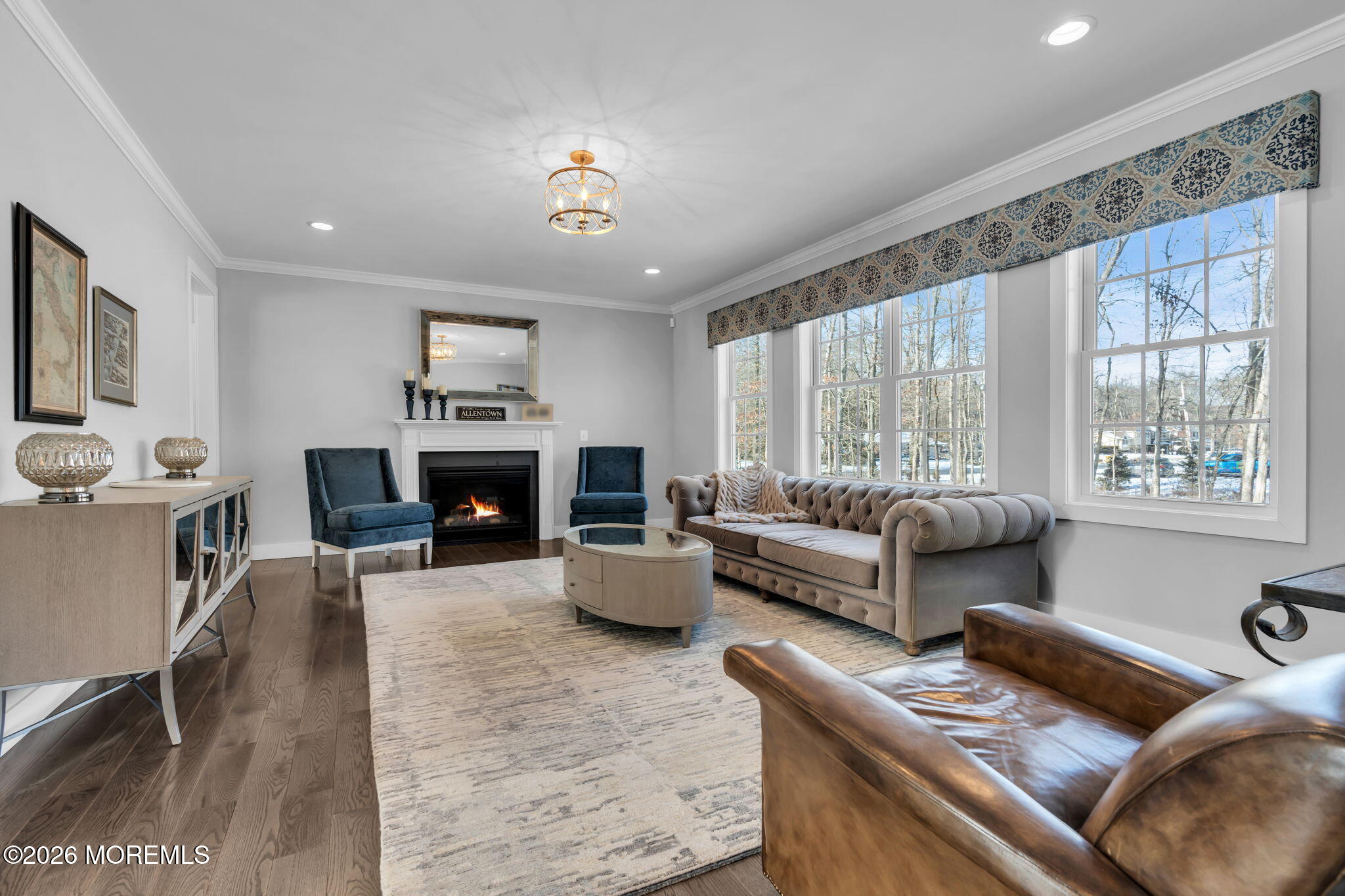 2 Tiffany Court Farmingdale, NJ 07727 - Photo 14 of 67 a living room with furniture and a fireplace