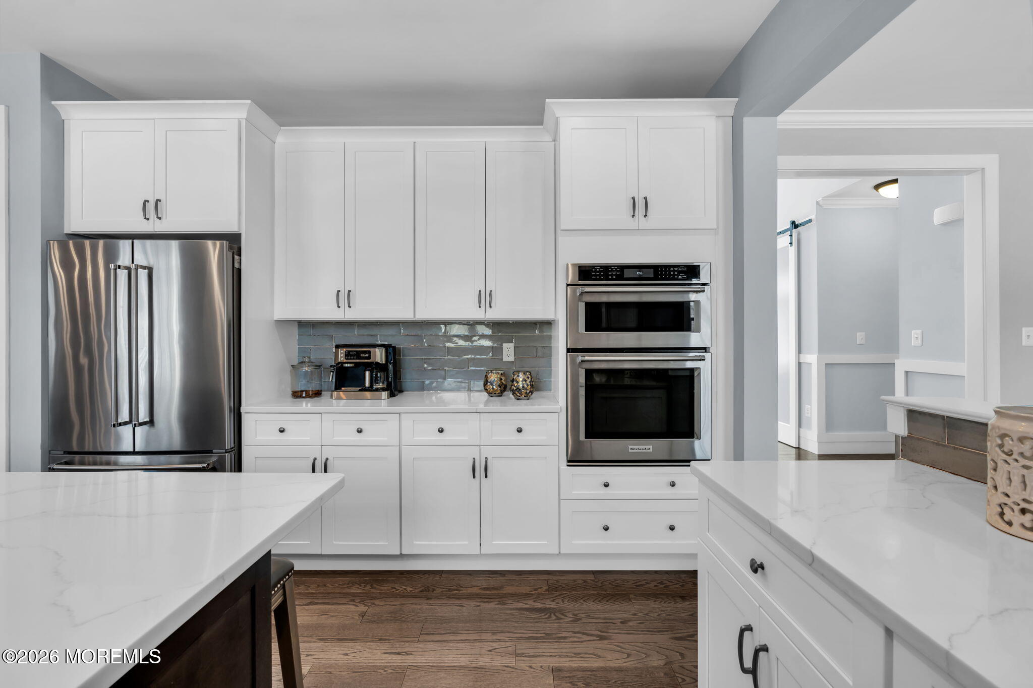 2 Tiffany Court Farmingdale, NJ 07727 - Photo 22 of 67 a kitchen with stainless steel appliances a refrigerator stove and white cabinets