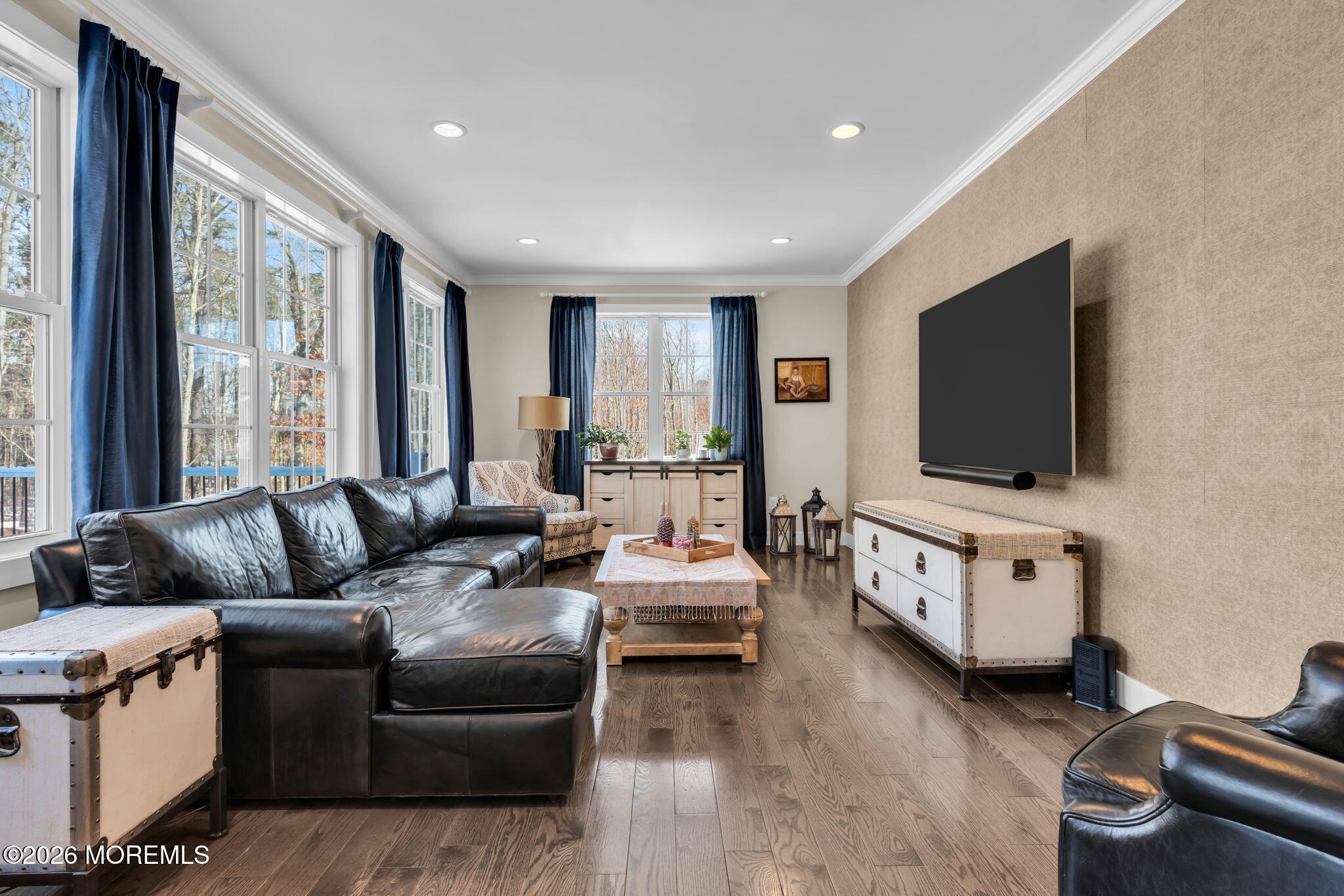 2 Tiffany Court Farmingdale, NJ 07727 - Photo 28 of 67 a living room with furniture and a flat screen tv