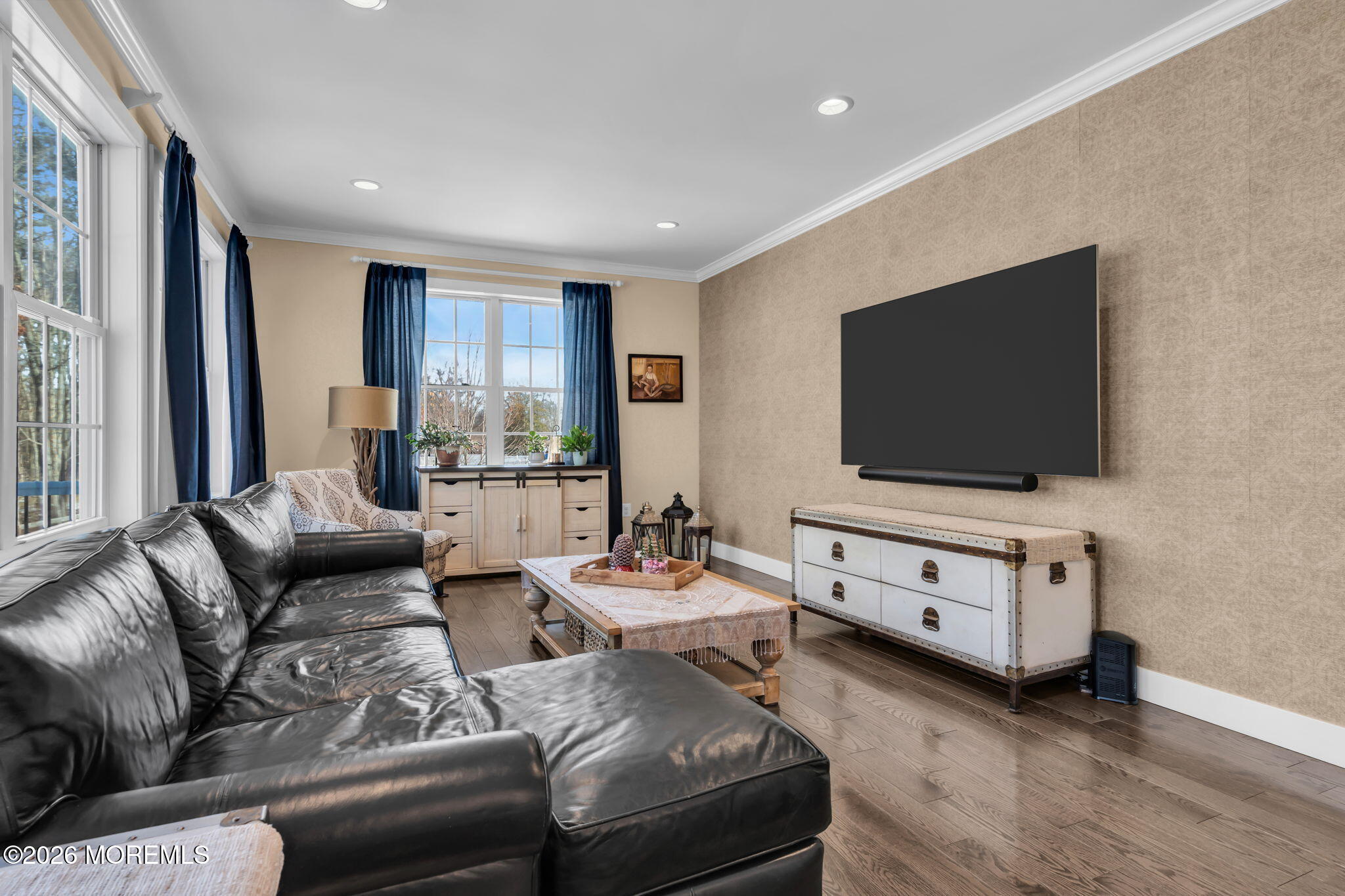 2 Tiffany Court Farmingdale, NJ 07727 - Photo 29 of 67 a living room with furniture and a flat screen tv