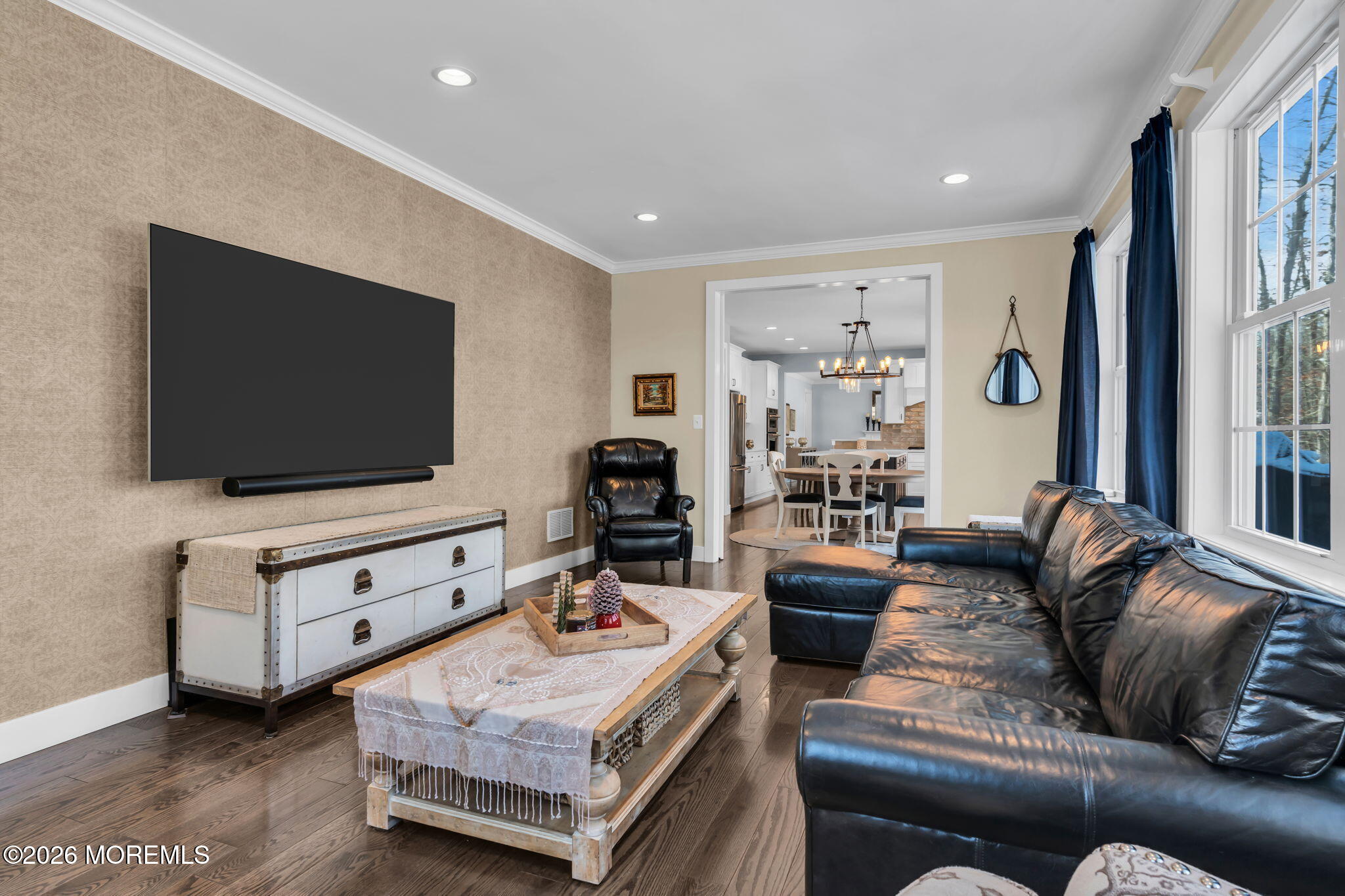 2 Tiffany Court Farmingdale, NJ 07727 - Photo 30 of 67 a living room with furniture and a flat screen tv