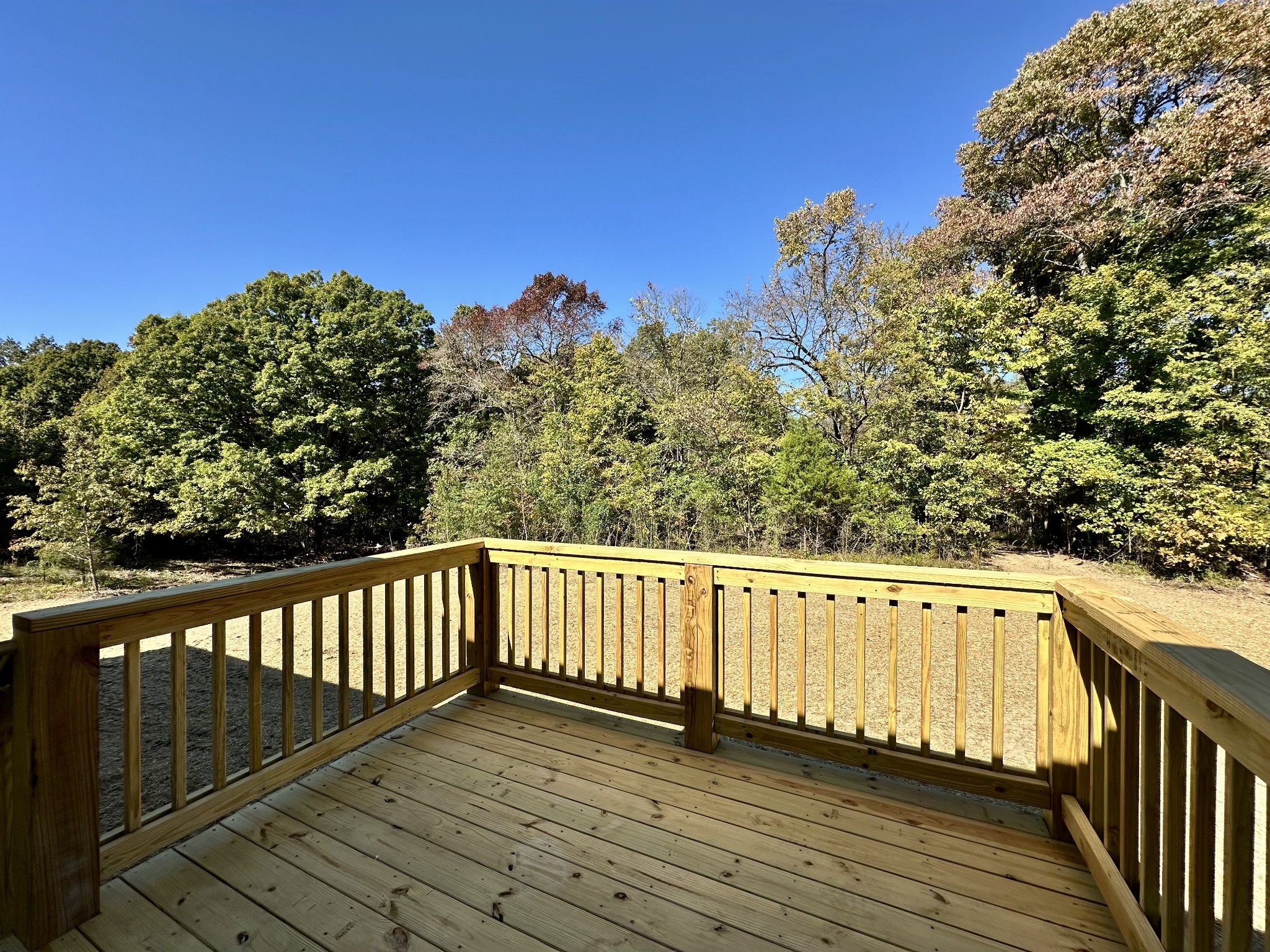 1739 Fairfield Road Westmoreland, TN 37186 - Photo 15 of 28 a view of deck with wooden floor and fence