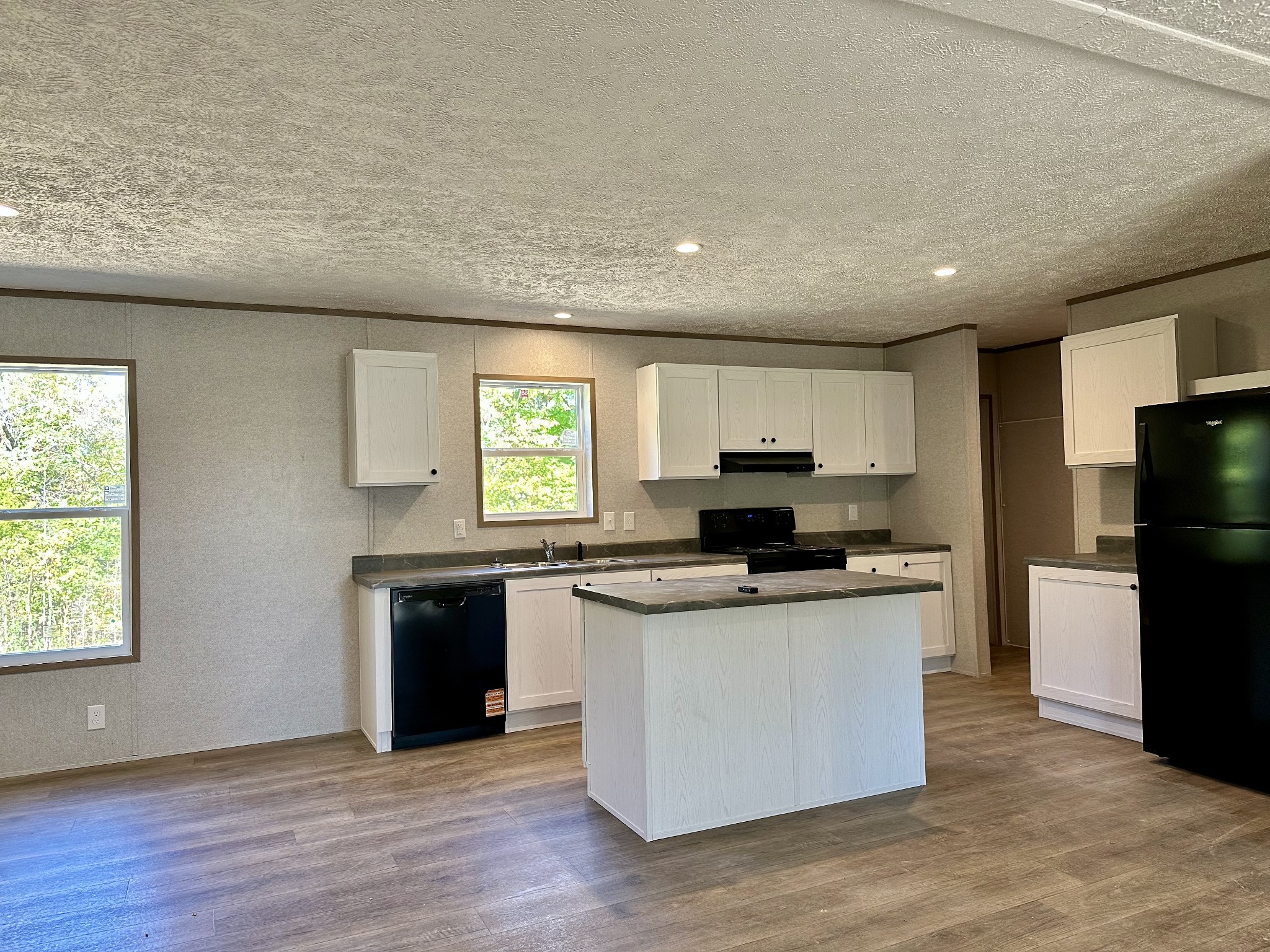 1739 Fairfield Road Westmoreland, TN 37186 - Photo 20 of 28 a kitchen with stainless steel appliances granite countertop a stove and a sink