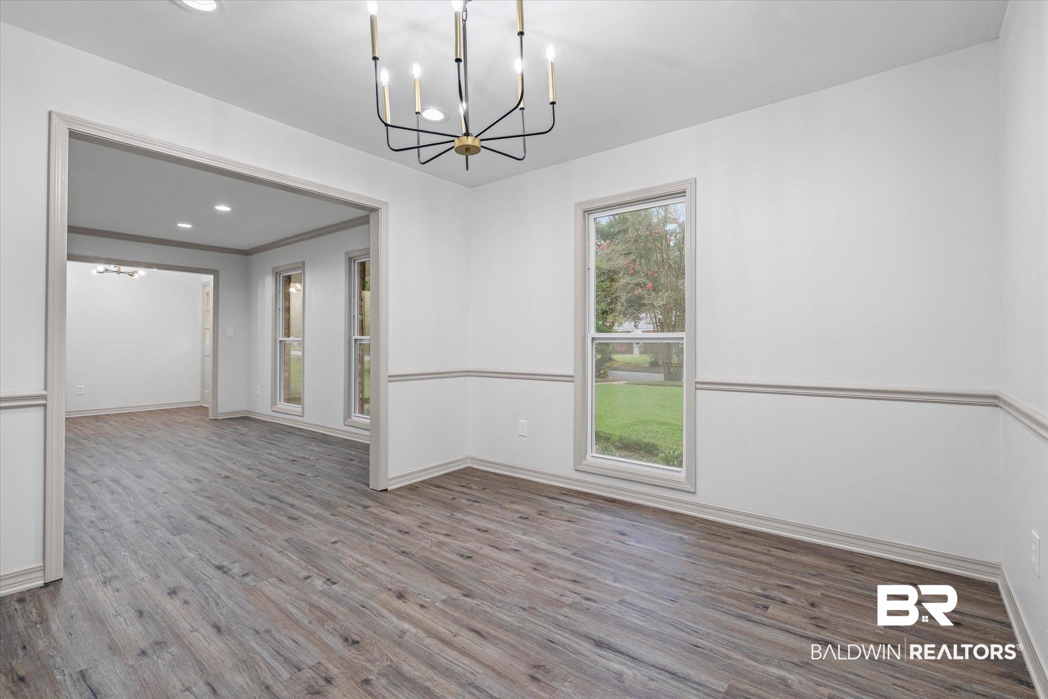 3655 Claridge Road South Mobile, AL 36608 - Photo 7 of 32 Unfurnished dining area with a chandelier, wood finished floors, and recessed lighting