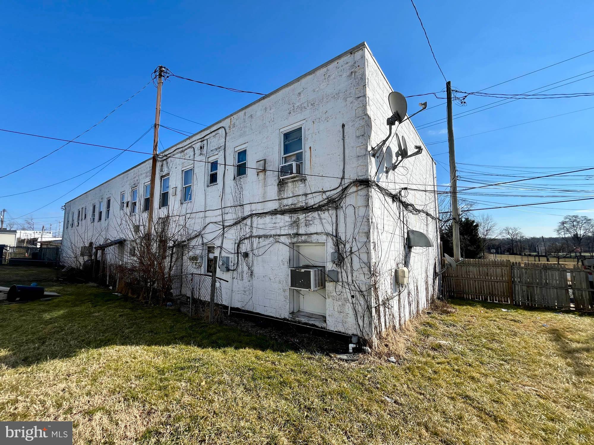 1725 Earhart Road Baltimore, MD 21221 - Photo 19 of 48 a view of a house with a yard
