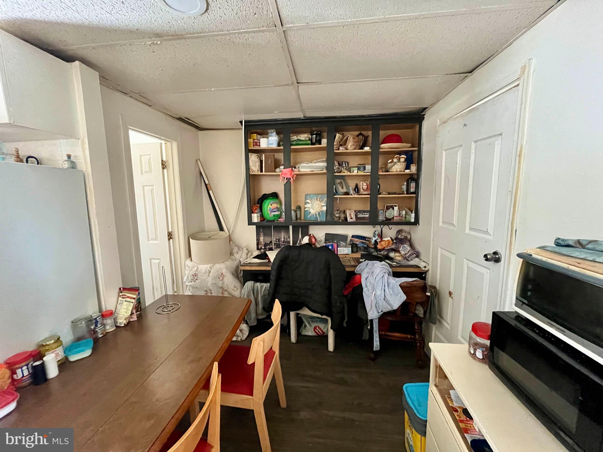 1725 Earhart Road Baltimore, MD 21221 - Photo 27 of 48 a bedroom with furniture and a window