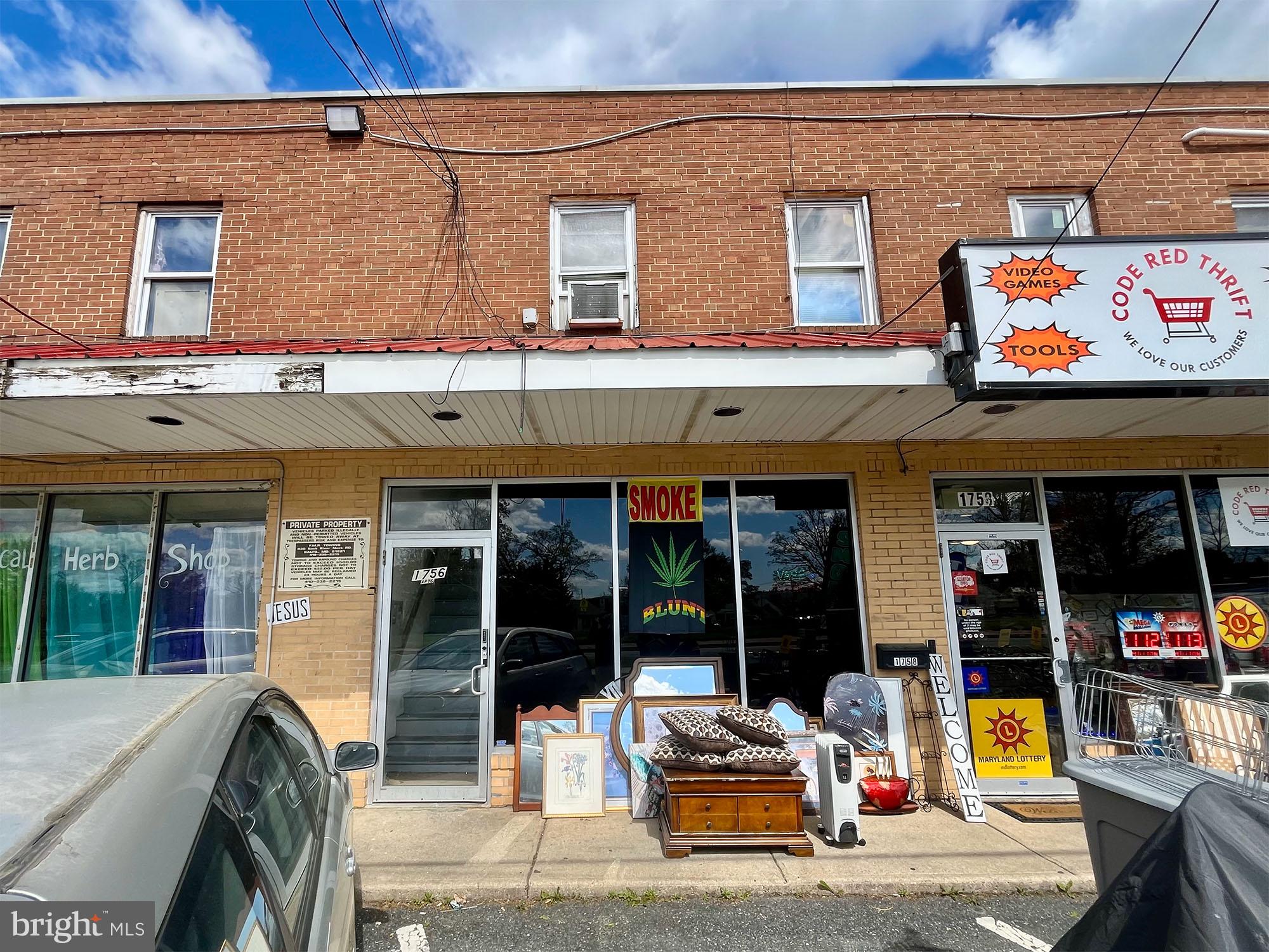 1725 Earhart Road Baltimore, MD 21221 - Photo 29 of 48 a view of a building with sitting area