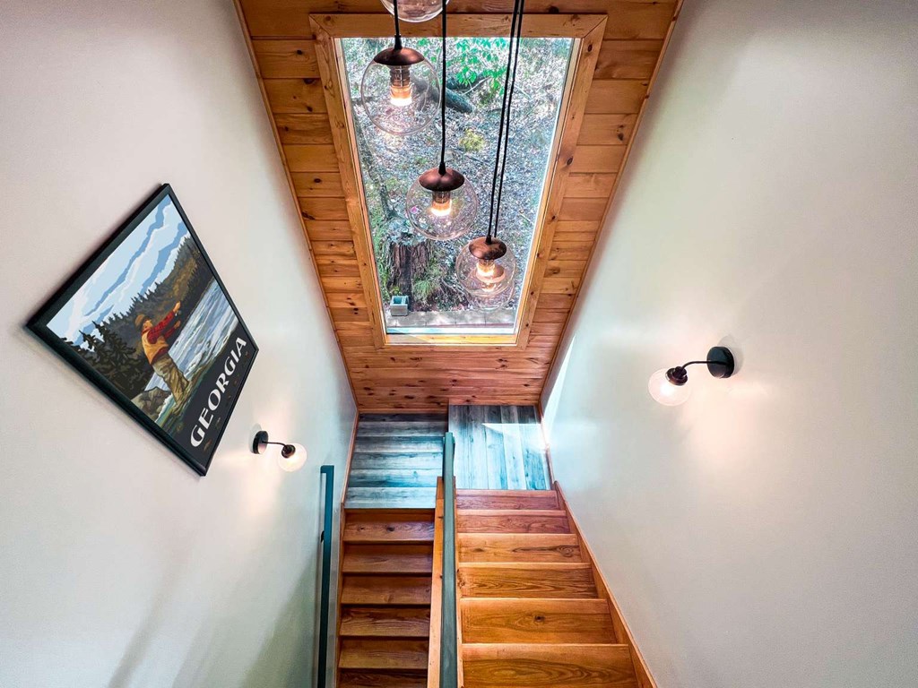 7 Addle Court Ellijay, GA 30540 - Photo 12 of 20 a view of a hallway with stairs