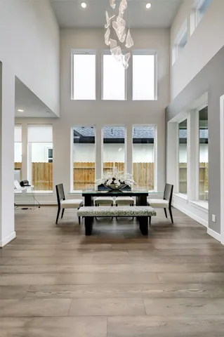 a kitchen with stainless steel appliances a stove refrigerator sink and microwave