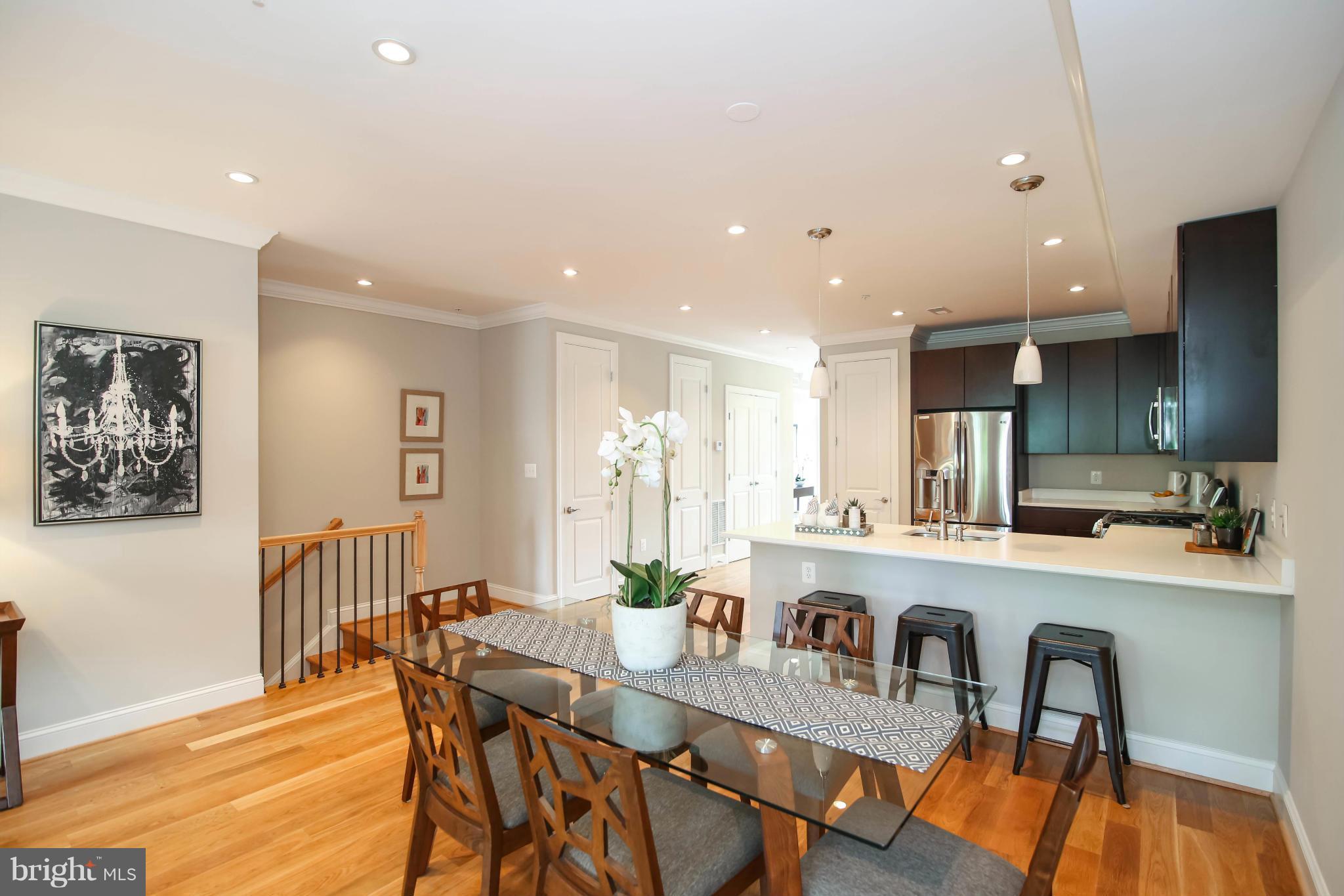 1131 5th Street Northeast, Unit 2 Washington, DC 20002 - Photo 6 of 27 a view of a dining room with furniture