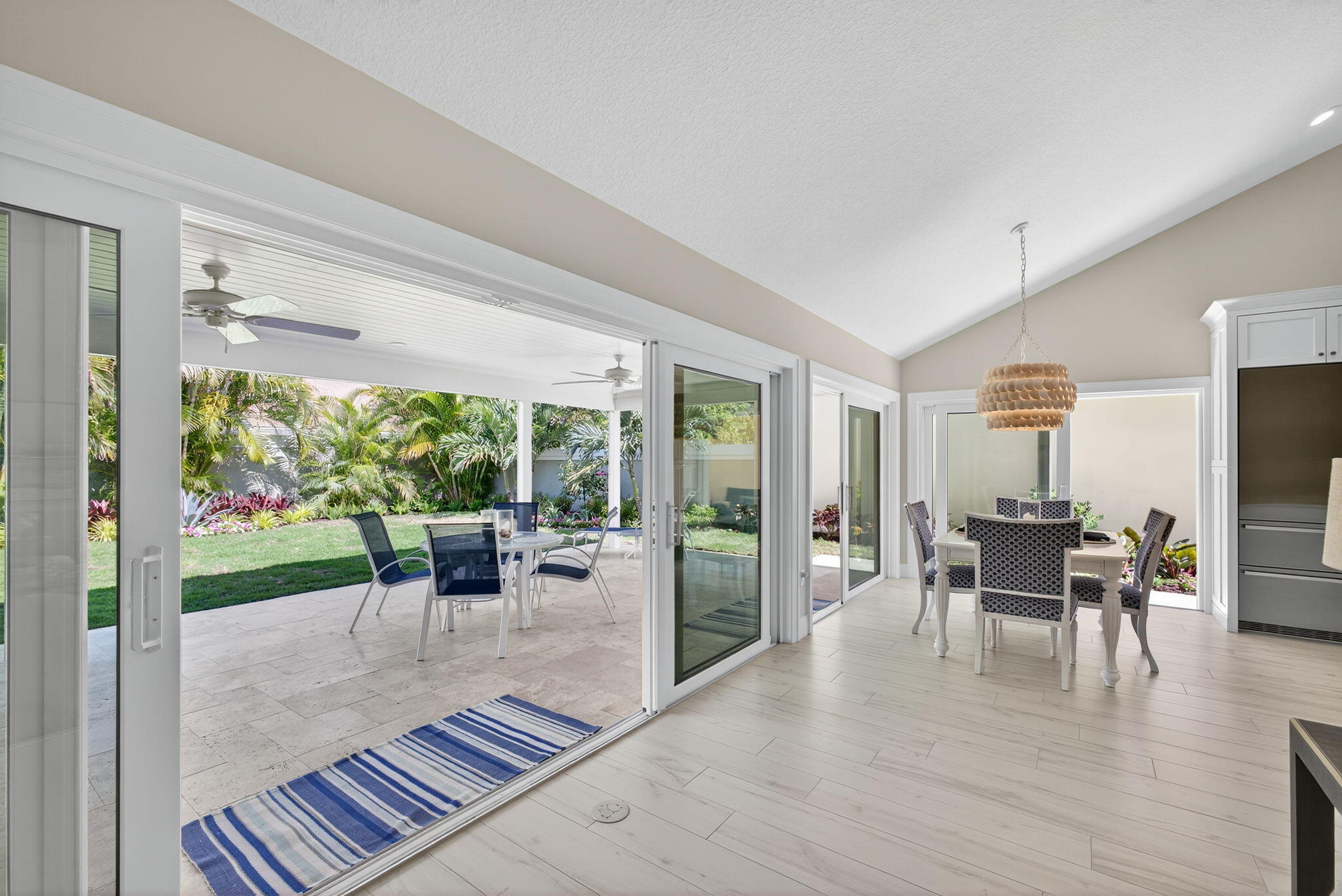 156 Ocean Pines Terrace Jupiter, FL 33477 - Photo 18 of 41 a dining room with furniture window and wooden floor
