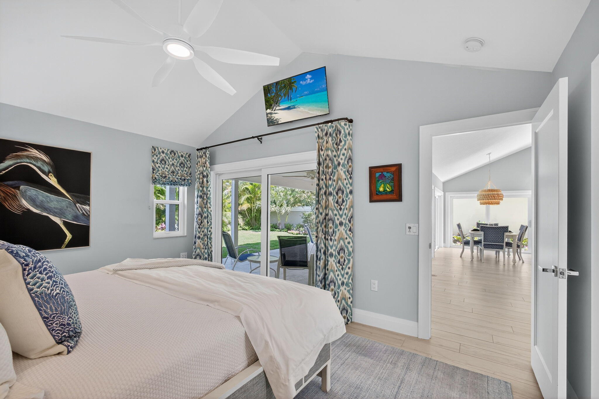 156 Ocean Pines Terrace Jupiter, FL 33477 - Photo 21 of 41 a bedroom with a bed a table and chair