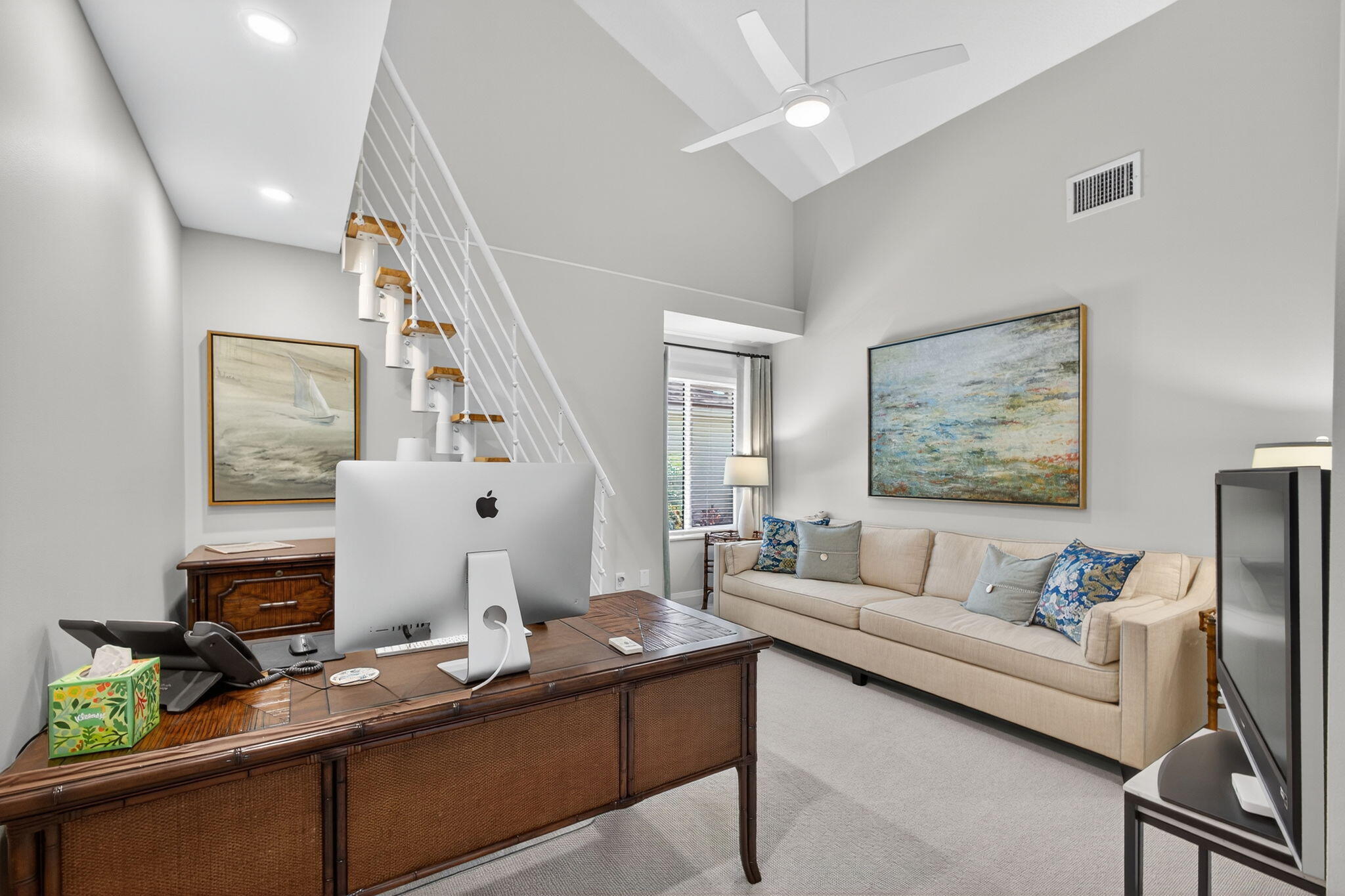 156 Ocean Pines Terrace Jupiter, FL 33477 - Photo 25 of 41 a living room with furniture and a wooden floor