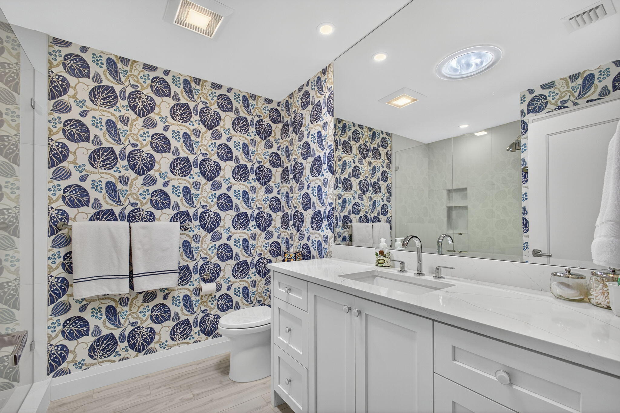 156 Ocean Pines Terrace Jupiter, FL 33477 - Photo 29 of 41 a bathroom with a double vanity sink toilet and a mirror