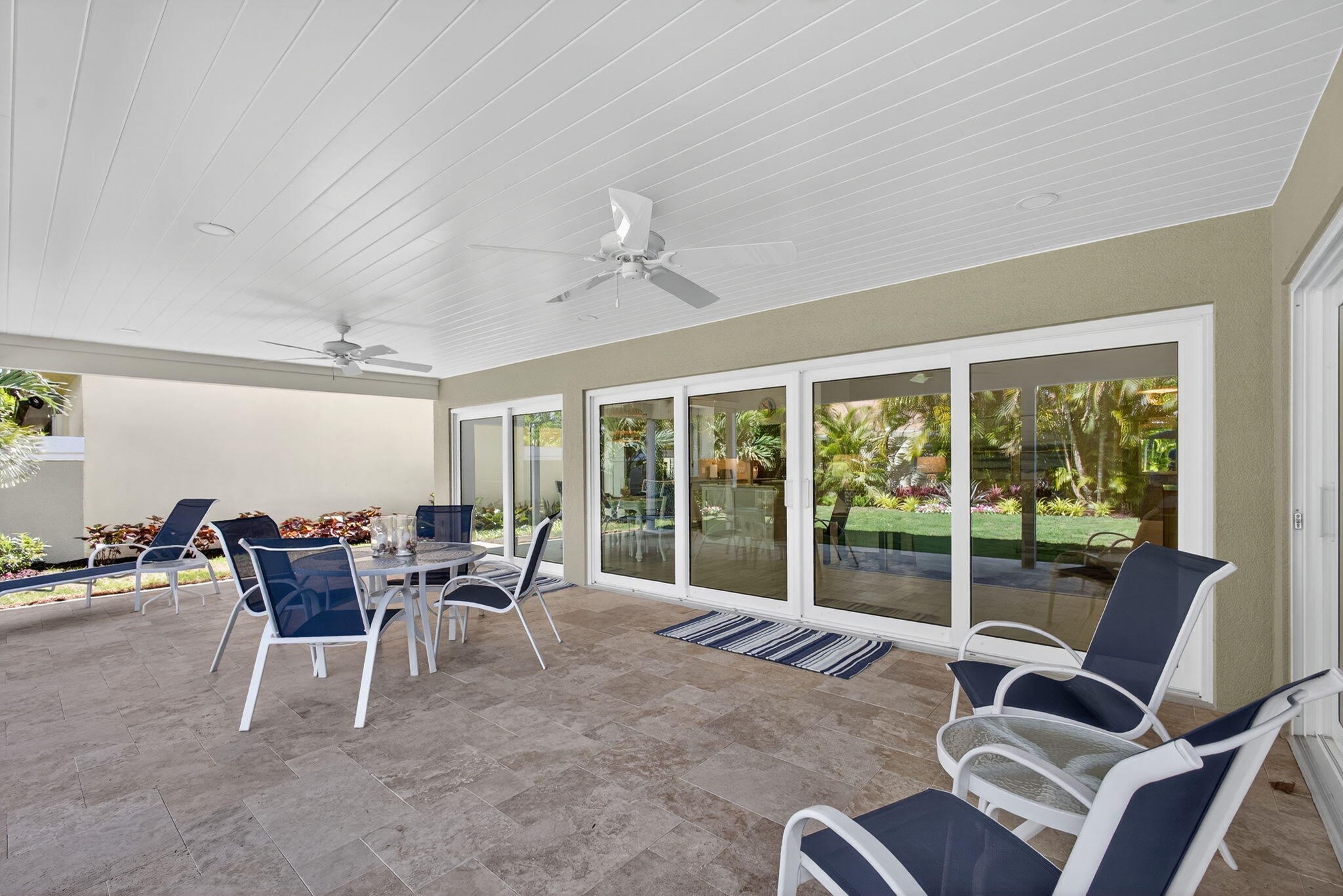 156 Ocean Pines Terrace Jupiter, FL 33477 - Photo 34 of 41 a dining room with furniture and large windows