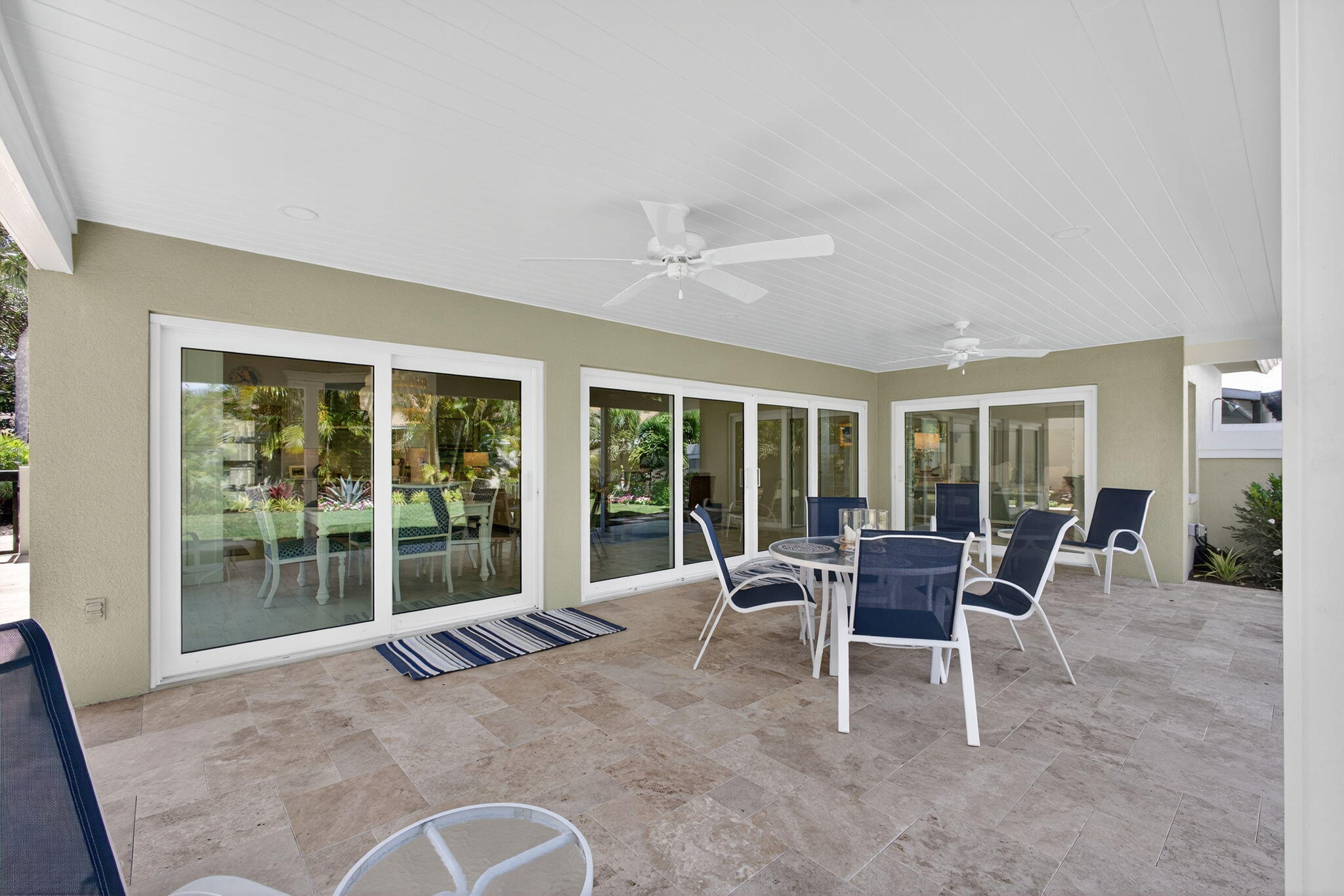 156 Ocean Pines Terrace Jupiter, FL 33477 - Photo 35 of 41 a dining room with furniture and large windows