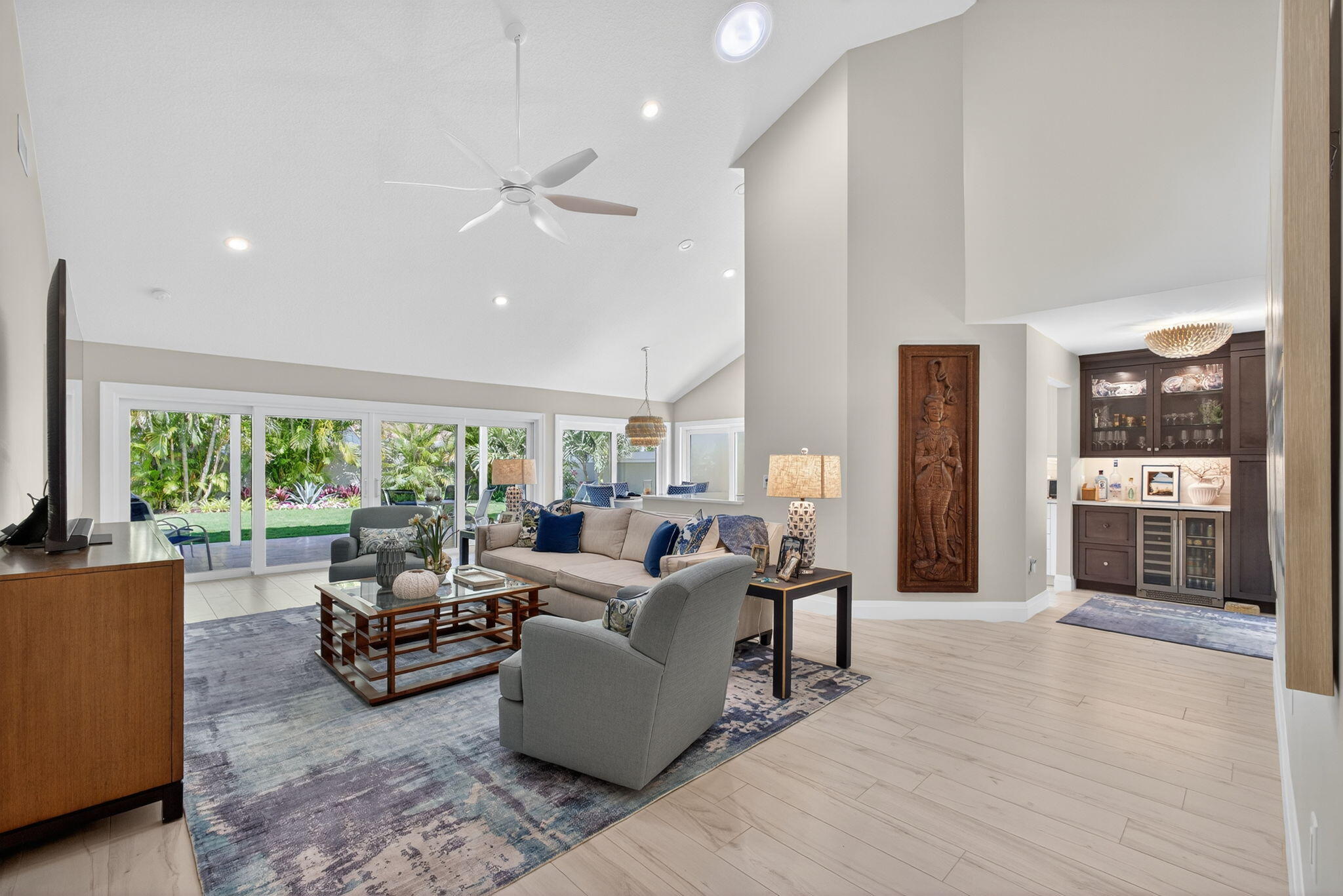 156 Ocean Pines Terrace Jupiter, FL 33477 - Photo 7 of 41 a living room with furniture and a large window