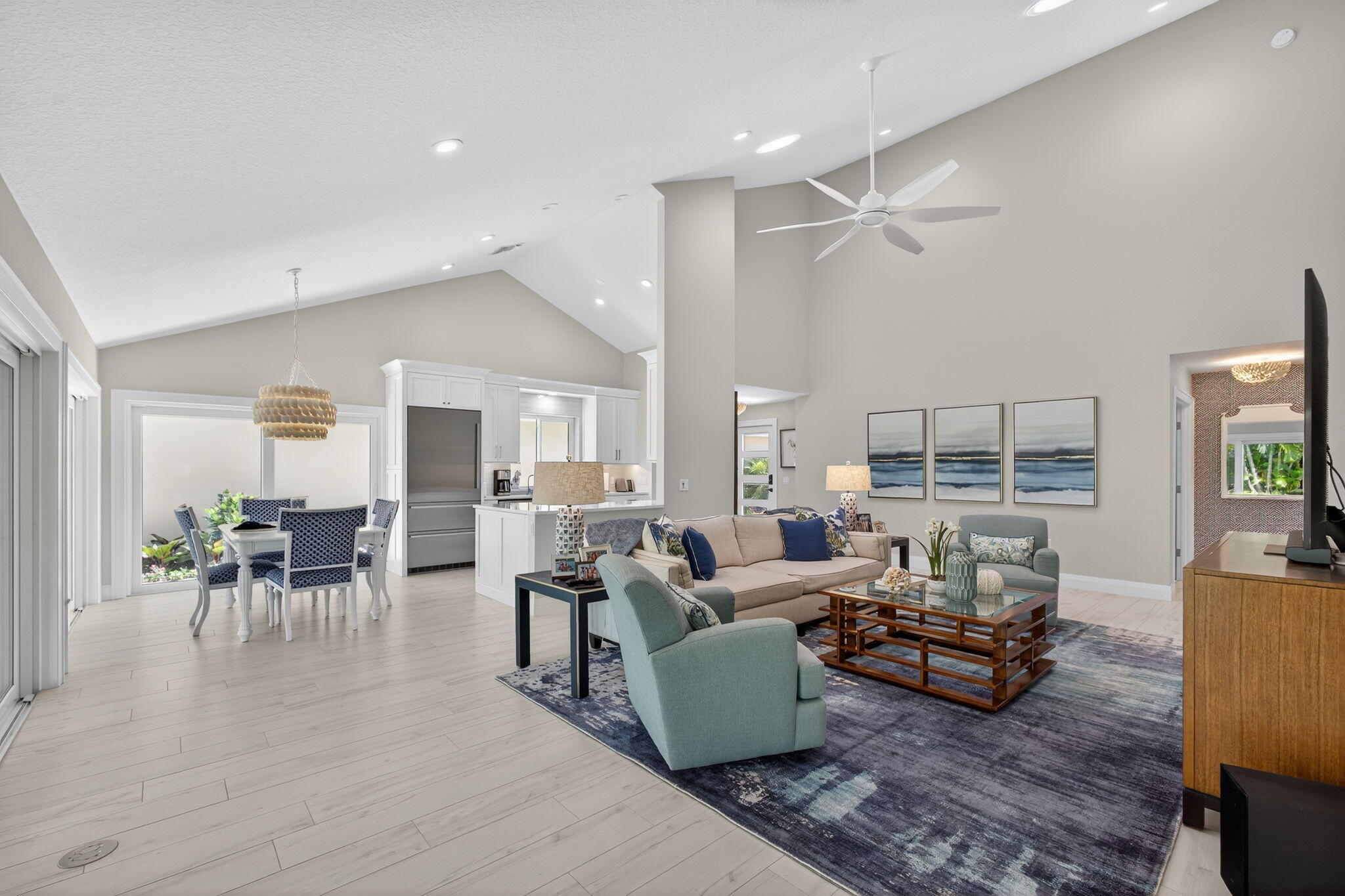 156 Ocean Pines Terrace Jupiter, FL 33477 - Photo 8 of 41 a living room with furniture and a table