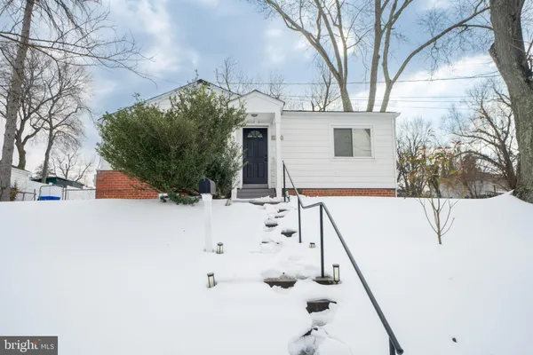 a view of house with snow on the background
