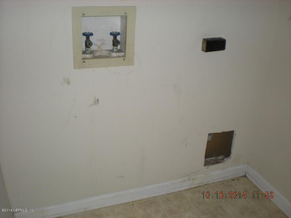 8815 Ivey Road Jacksonville, FL 32216 - Photo 8 of 10 Laundry Room