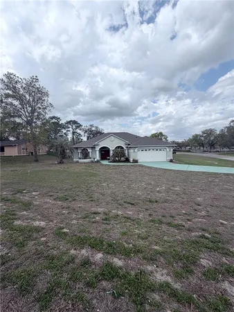 $380,000 | 13476 Little Farms Drive, Spring Hill, FL 34609