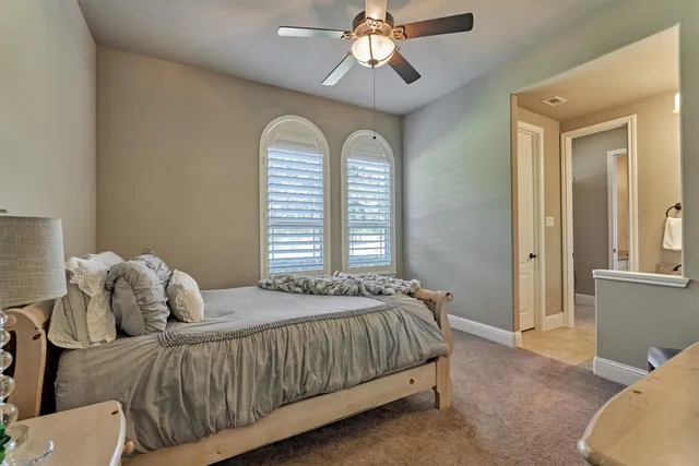 a kitchen with stainless steel appliances granite countertop a refrigerator and a stove