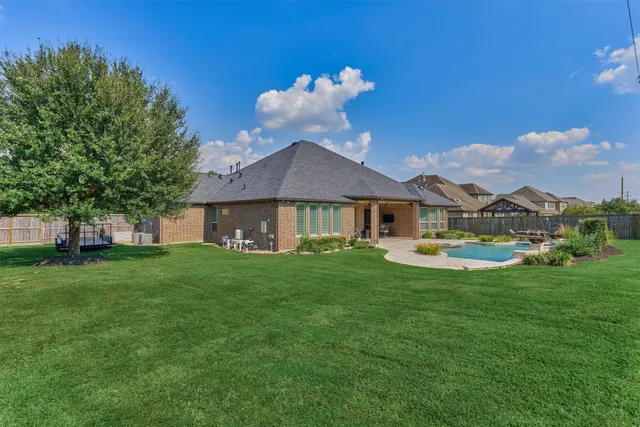 a lobby with furniture and a potted plant