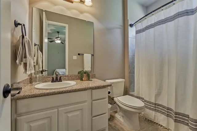 a view of a house with swimming pool and a yard