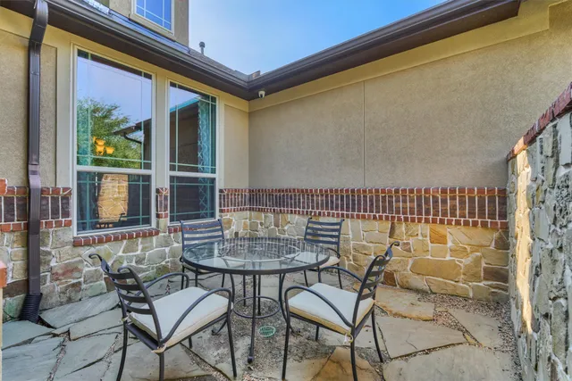 a view of a livingroom with furniture and a fireplace