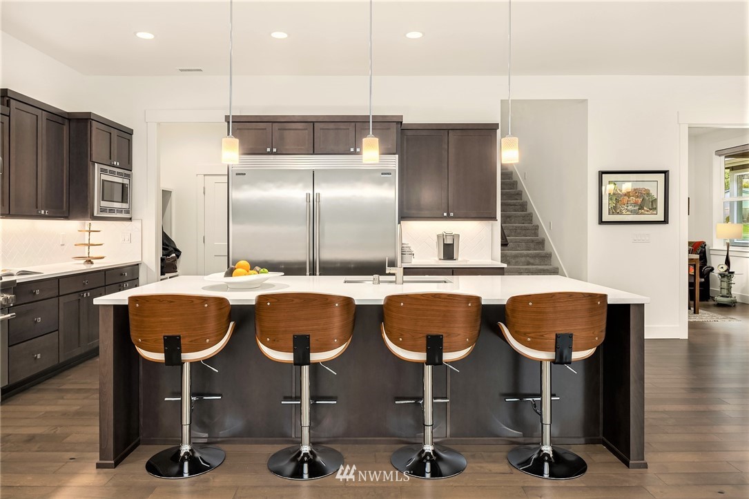 36234 Southeast Fish Hatchery Road Fall City, WA 98024 - Photo 7 of 33 a kitchen with cabinets and chairs