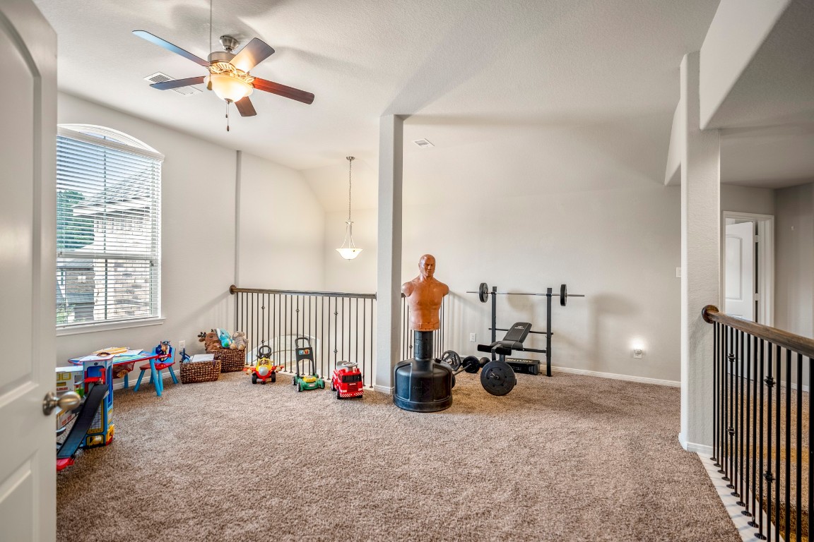 23006 Mulberry Tree Lane Spring, TX 77389 - Photo 28 of 50 Upstairs, a spacious game room offers plenty of flexibility—perfect for play, hobbies, or a workout space.