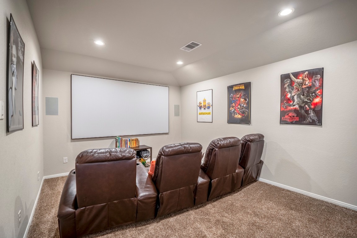 23006 Mulberry Tree Lane Spring, TX 77389 - Photo 30 of 50 A dedicated media room with dimmable lighting makes the perfect spot for movie nights at home.