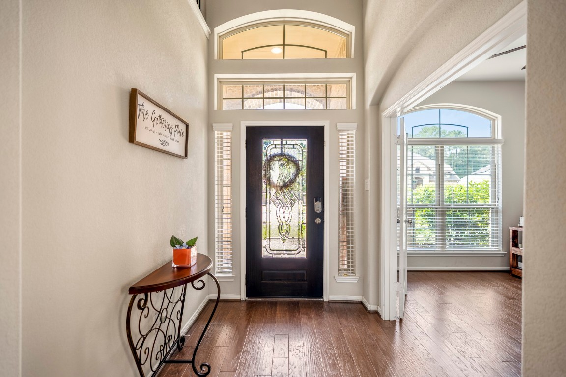 23006 Mulberry Tree Lane Spring, TX 77389 - Photo 6 of 50 Light pours through the glass front door and transom windows, brightening the foyer, while French doors to the right open into the study.