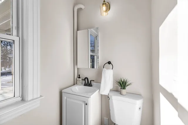 a bathroom with a sink and a toilet