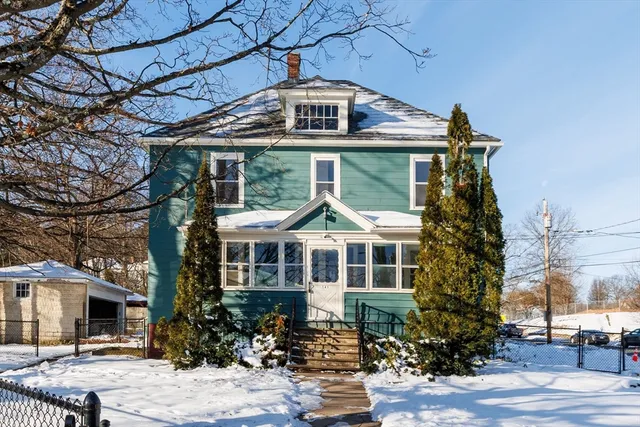 a view of a building with a street