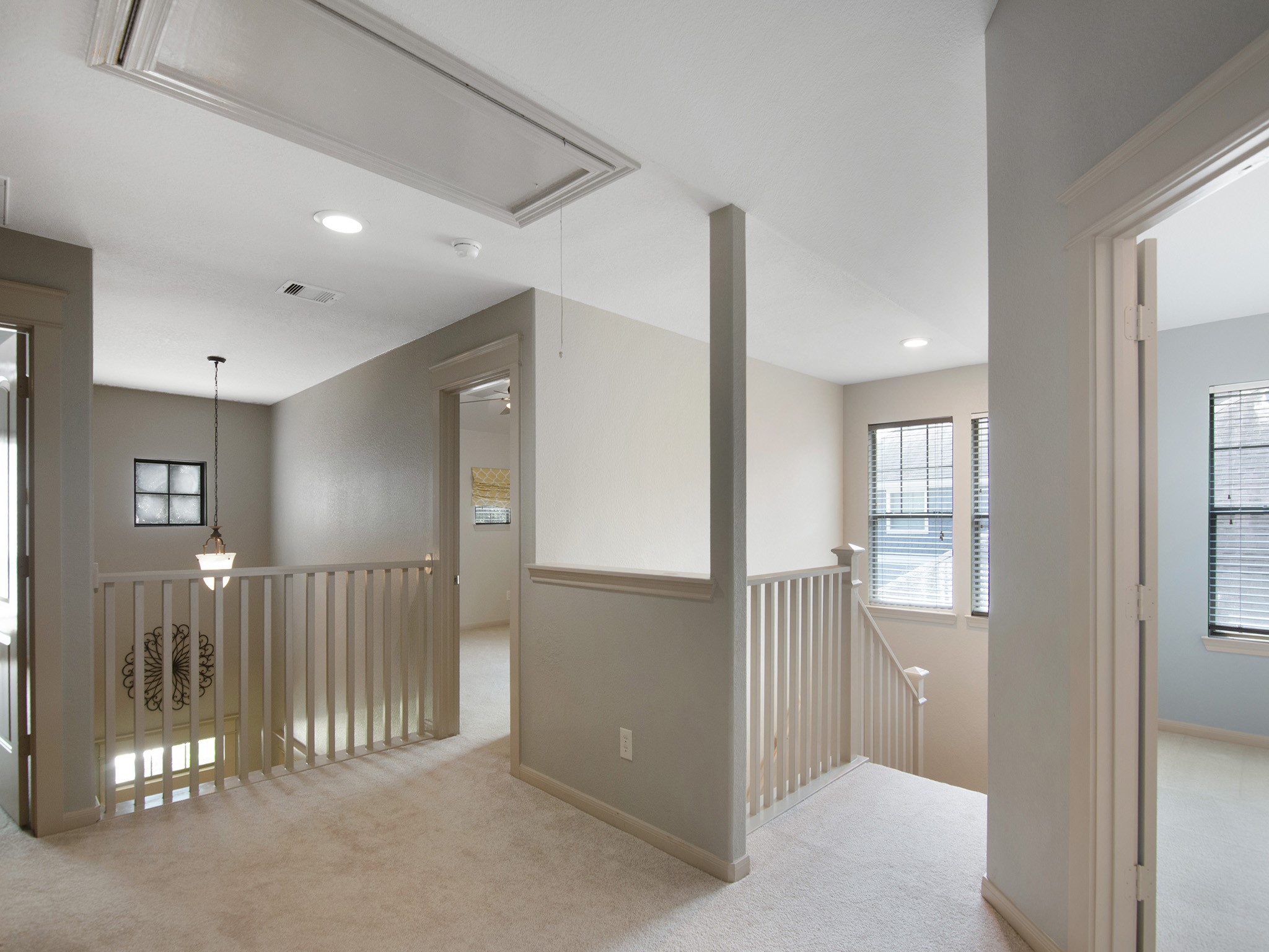 28323 Ryans Ridge Lane Spring, TX 77386 - Photo 27 of 45 Bright upstairs landing with plush carpeting and access to three bedrooms, a full bath and a game room.