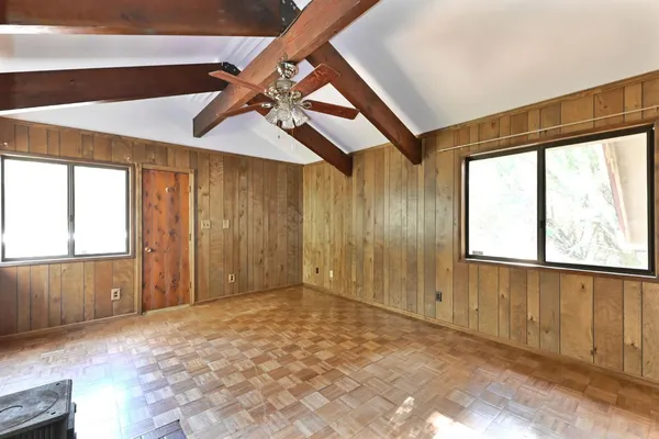 an empty room with a empty space and a window