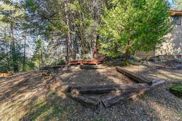 a view of backyard with green space